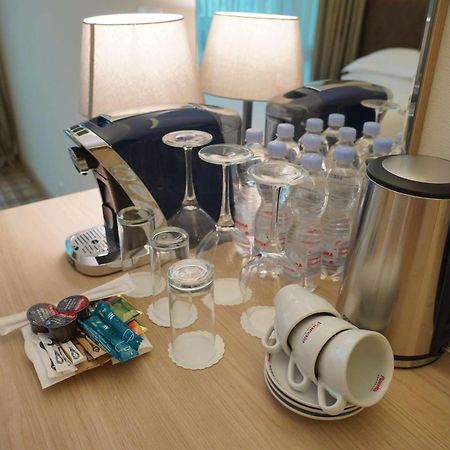 Best Western Premier Батуми Екстериор снимка A Nespresso coffee machine in a hotel room