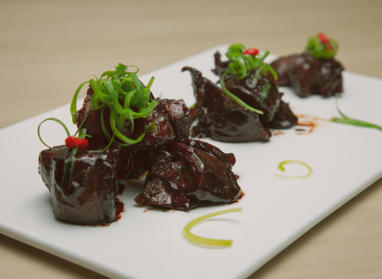 Best Western Premier Батуми Екстериор снимка A dish of dried abalone