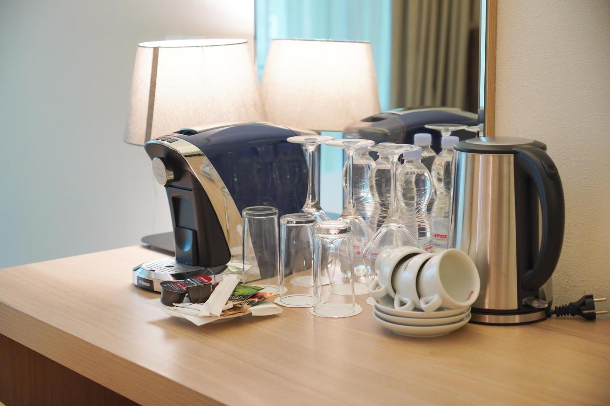 Best Western Premier Батуми Екстериор снимка A Nespresso machine in a hotel room