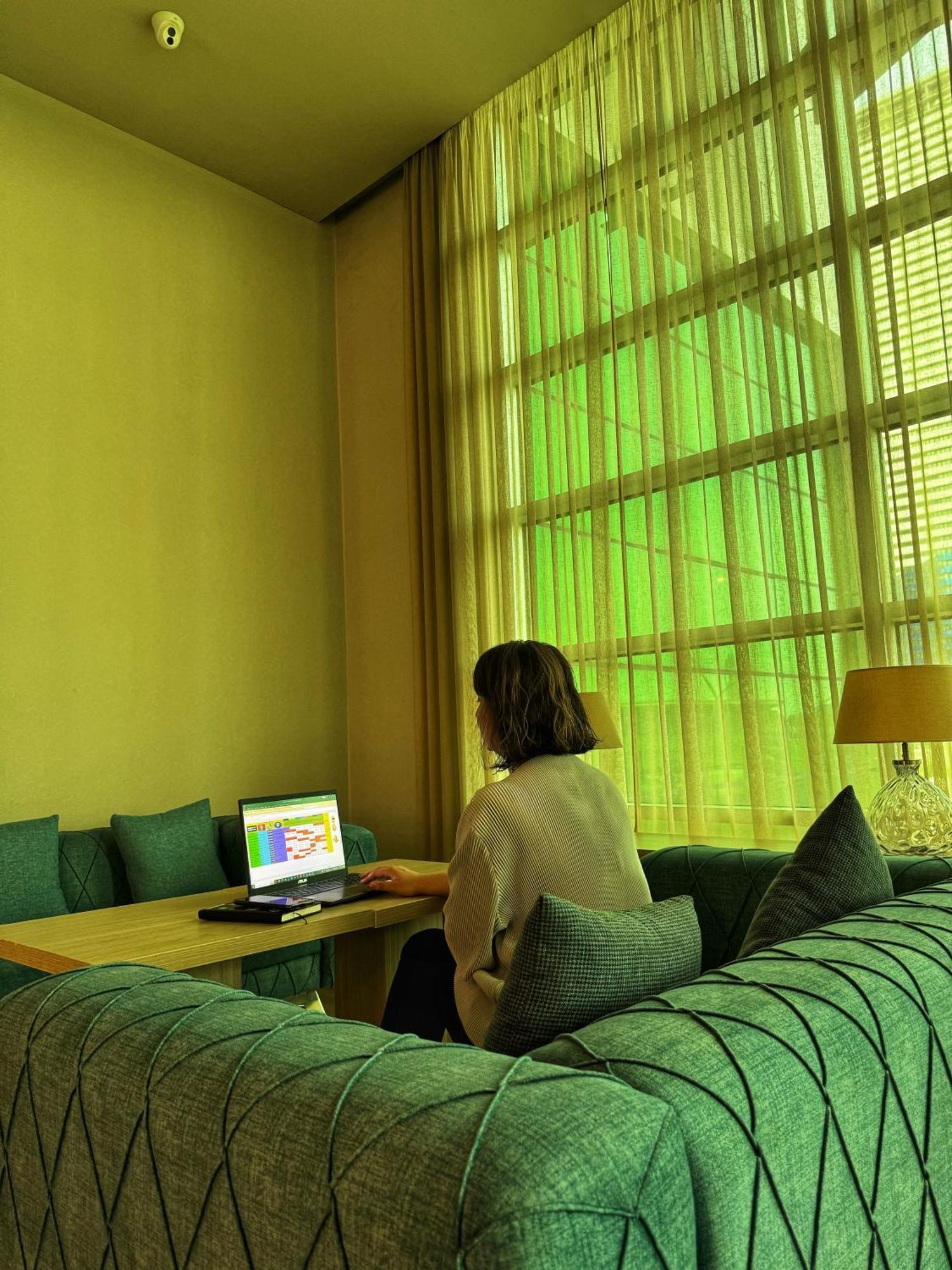 Best Western Premier Батуми Екстериор снимка A woman using a laptop