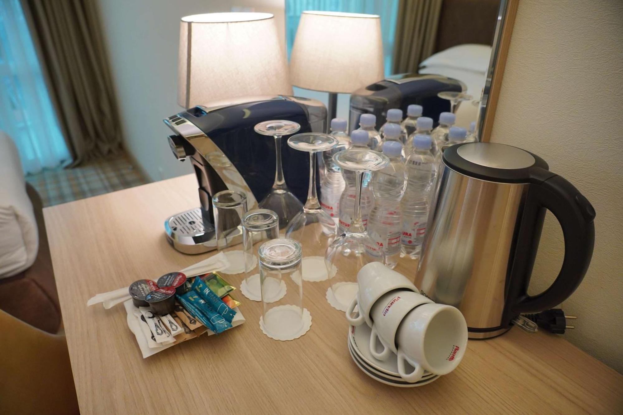Best Western Premier Батуми Екстериор снимка A Nespresso coffee machine in a hotel room